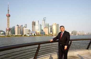  The Honourable Peter Van Loan, Minister of International Trade, looks out across the Huangpu River to the  modern skyscrapers of Pudong, Shanghai at the start of his trade visit to China. 