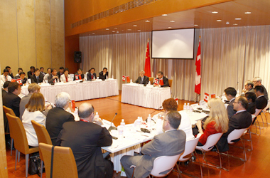 The Honourable Peter Van Loan, Minister of International Trade, and David Mulroney, Canada's Ambassador to China, take part in the Canada-China Scinece and Technology Committee Meeting at the Shanghai Expo's Canada Pavilion. The focus of the meeting was on clean technology.