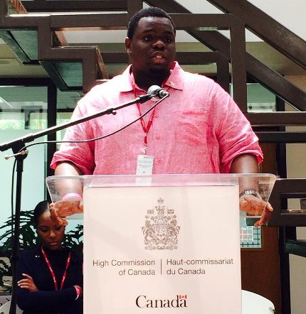 Rol–J Williams, Runner Up, addresses High Commission staff at the Town Hall.