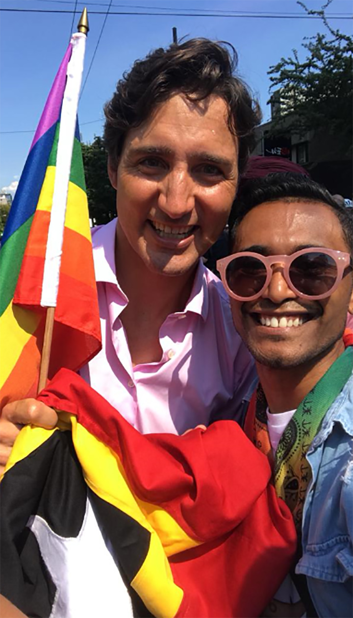 Natalino Guterres marches with Prime Minister Trudeau at the Vancouver Pride Parade during the Equal Rights Coalition Global Conference.