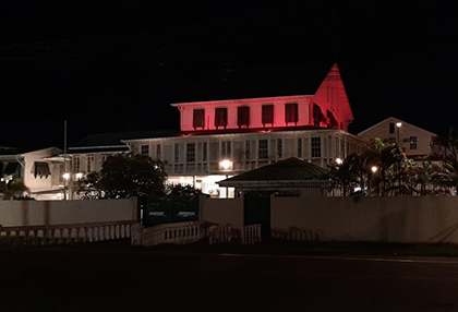 The High Commission Building turns orange.