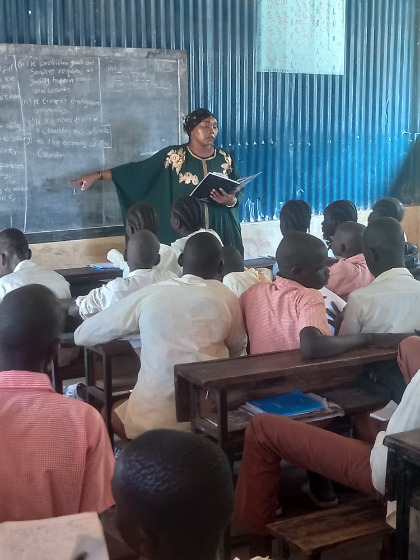 Christine Mwongera, a teacher at the Kakuma refugee camp in Kenya and a member of the Refugee Education Council, presents a lesson in her class.